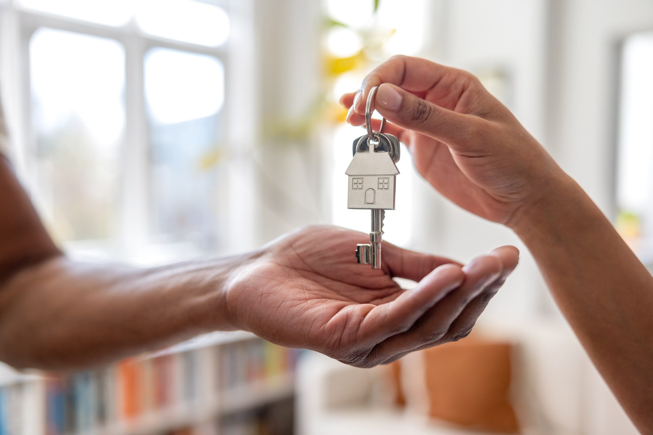 What To Do When Moving House | MD Movers homeowner receiving new keys